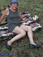 73 year old grandma Hanna D. seduced a younger stranger to fuck her in an open field